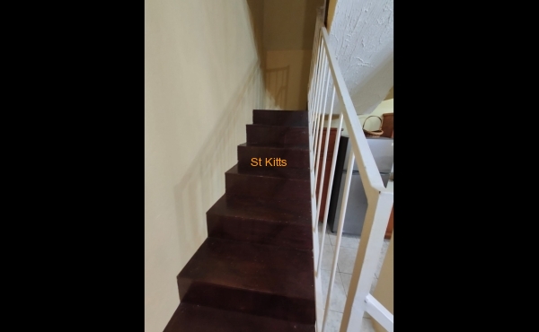 Stairs to bedroom on second floor