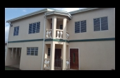 Back of building leading to apts